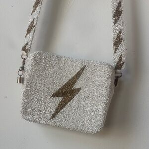 Elegant White Beaded Crossbody Bag with Lightning Bolt